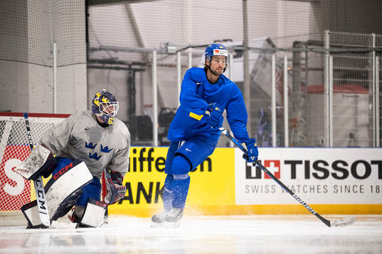 Goaltender Marcus Högberg and Mathias Bromé of Sweden at