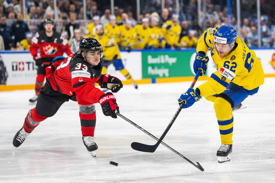Ryan Graves of Canada and Joel Kellman of Sweden