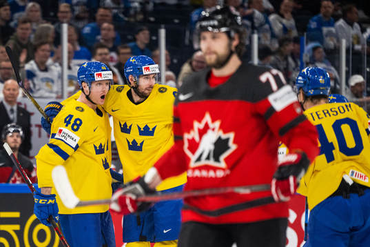 Carl Klingberg of Sweden celebrates with Marcus Pettersson