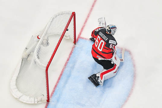 Carl Klingberg of Sweden (not pictured) scores 1-0 behind