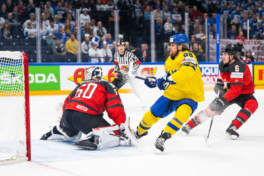 William Nylander of Sweden scores 2-0 behind goaltender