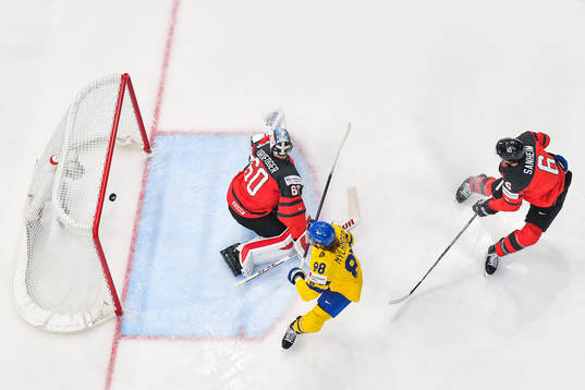William Nylander of Sweden scores 2-0 behind goaltender