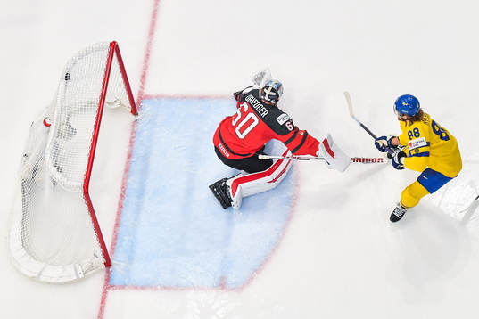 William Nylander of Sweden scores 2-0 behind goaltender