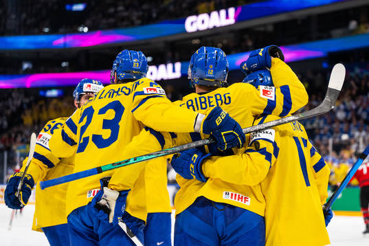 Max Friberg of Sweden celebrates with team mates