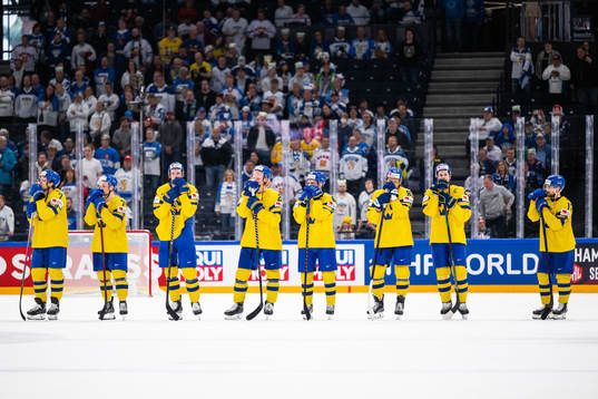 Players of Sweden look dejected