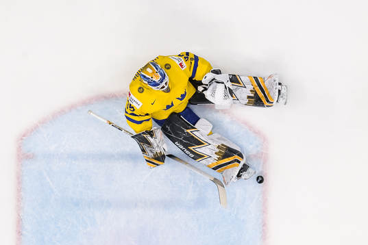 Drake Batherson of Canada (not pictured) scores 3-4 behind