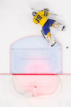 Drake Batherson of Canada (not pictured) scores 3-4 behind