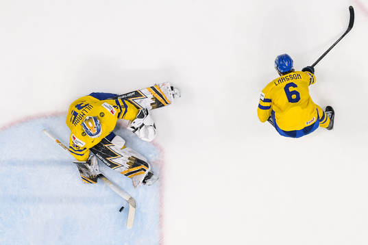 Drake Batherson of Canada (not pictured) scores 3-4 behind