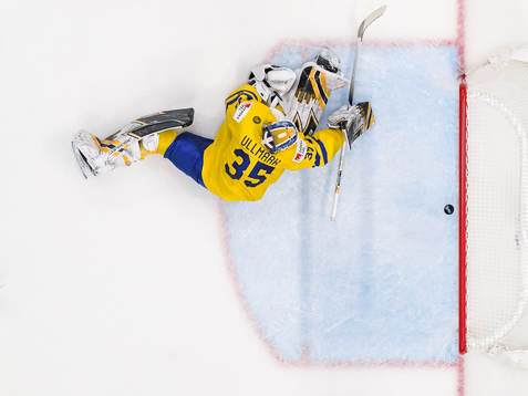 goaltender Linus Ullmark of Sweden looks dejected