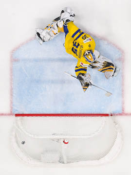 Drake Batherson of Canada (not pictured) scores 3-4 behind