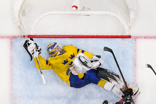 goaltender Linus Ullmark of Sweden looks dejected