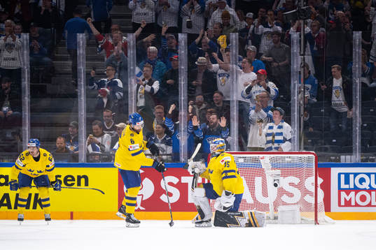 Joel Kellman, Adam Larsson and goaltender Linus Ullmark of