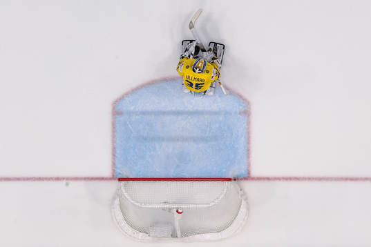 Goaltender Linus Ullmark of Sweden looks dejected