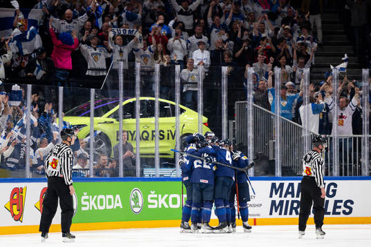 Players of Finland celebrate the 2-1 goal by Sakari Manninen