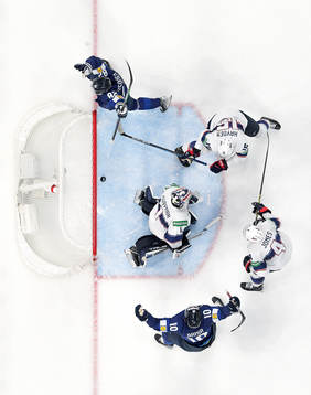 Harri Pesonen and Joel Armia of Finland celebrate the 3-2