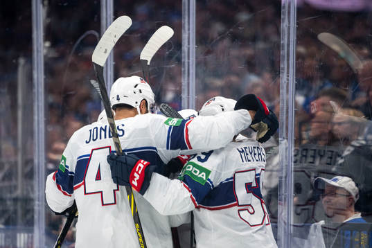 Sean Farrell of USA celebrate with teammates