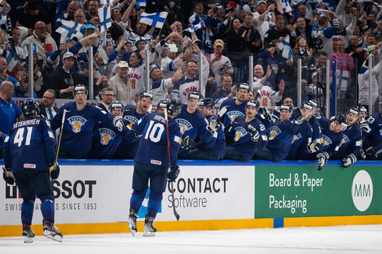 Players of Finland celebrate with Joel Armia