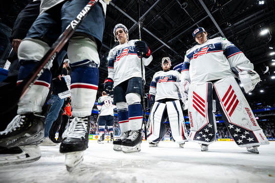 Goaltender Jeremy Swayman of USA look dejected with
