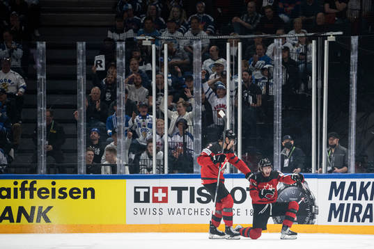 Kent Johnson of Canada celebrates