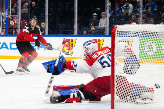 Cole Sillinger of Canada scores the 5-1 goal