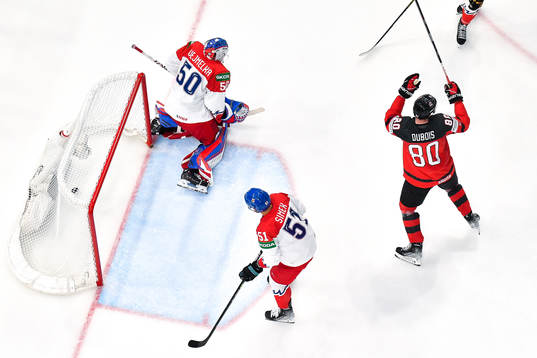 Pierre-Luc Dubois of Canada celebrates the 4-1 goal by Matt