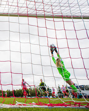 Elisabeth Terland of Brann scores the 1-1 goal behind