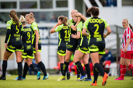 Elisabeth Terland of Brann celebrates with Guro Bergsvand