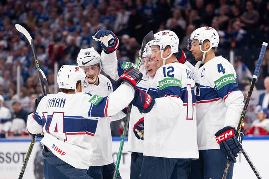 Adam Gaudette of USA celebrates with team-mates