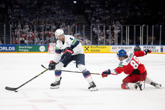 Seth Jones of USA and David Pastrnak of Czech Republic