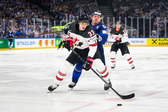 Ryan Graves of Canada and Mikael Granlund of Finland