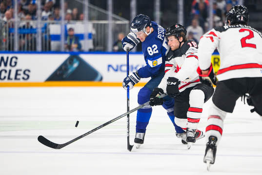 Harri Pesonen of Finland and Dawson Mercer of Canada