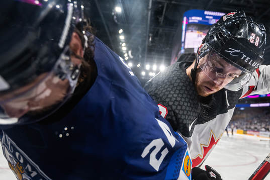Hannes Björninen of Finland and Damon Severson of Canada