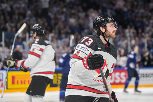 Noah Gregor of Canada looks dejected