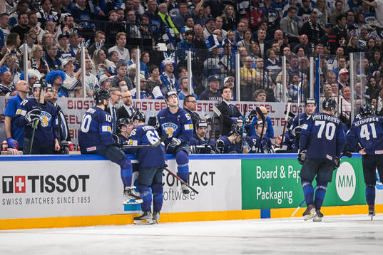 Valtteri Filppula of Finland and team mates looks dejected