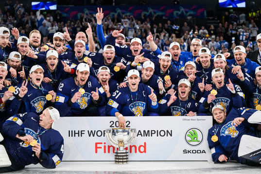 Players of Finland celebrating with gold medals