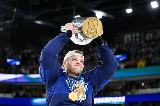 Teemu Hartikainen of Finland celebrates with gold medal