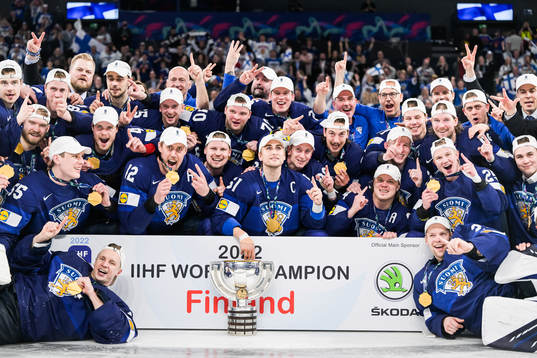 Players of Finland celebrating with gold medals