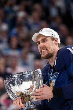 Marko Antilla of Finland celebrate with the trophy
