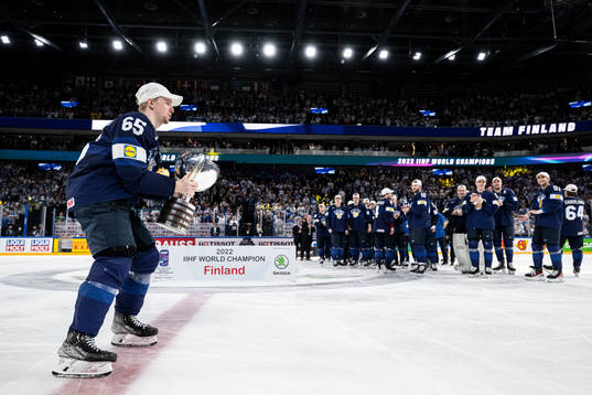 Sakari Manninen of Finland celebrates with the trophy