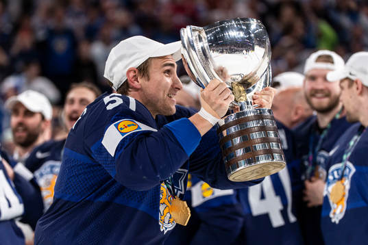 Valtteri Filppula of Finland celebrates with the trophy