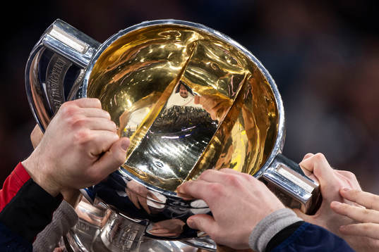 Players of Finland celebrate with the trophy