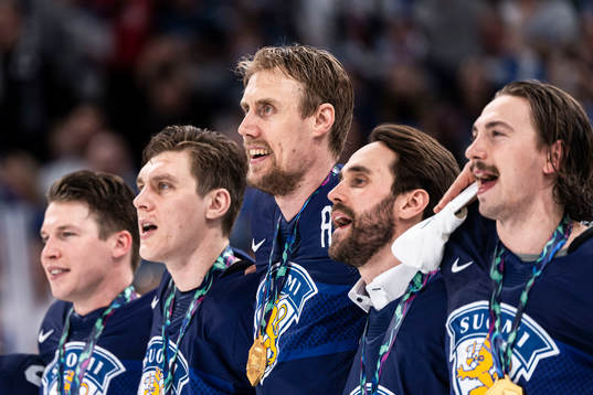 Marko Antilla of Finland with teammates