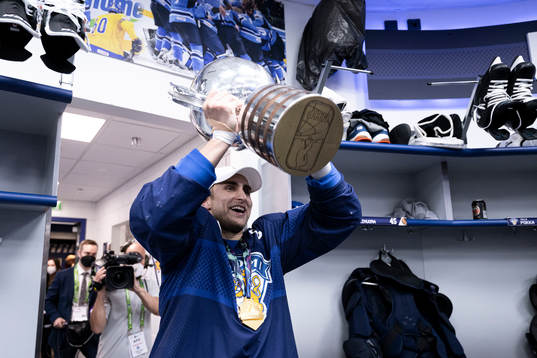 Valtteri Filppula of Finland celebrates with the trophy in