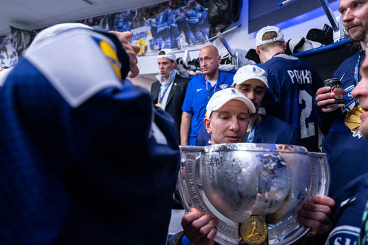 Toni Rajala of Finland celebrates with the torphy in the