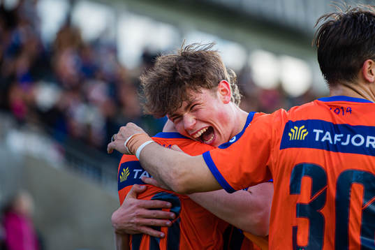 Oscar Solnørdal of Aalesund celebrates with Nikolai Hopland