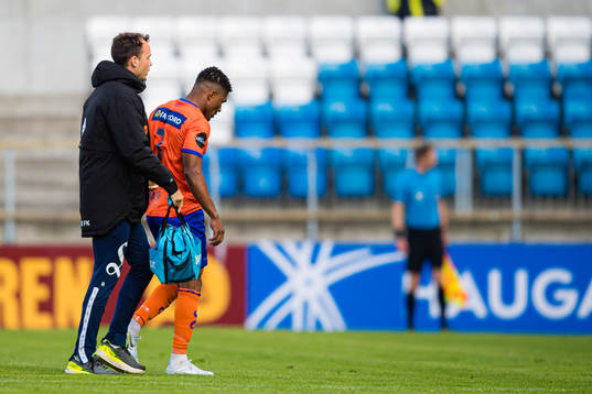 Erikson Spinola Lima of Aalesund leaves the pitch with an