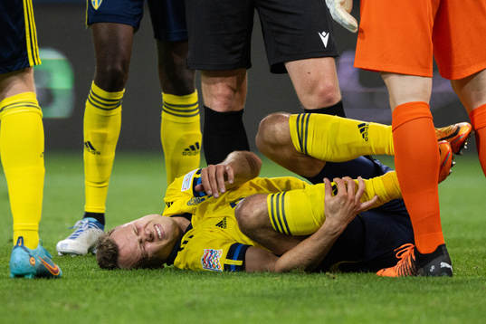 Viktor Claesson of Sweden in pain