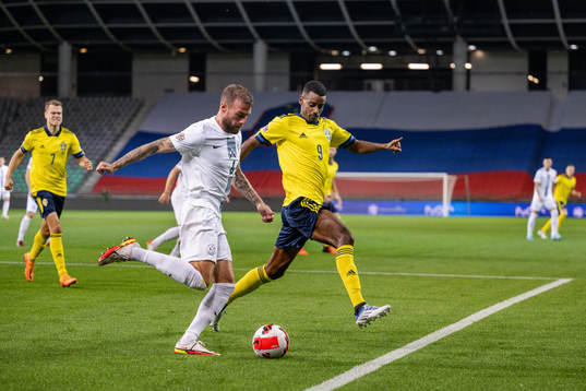 Miha Blazic of Slovenia and Alexander Isak of Sweden