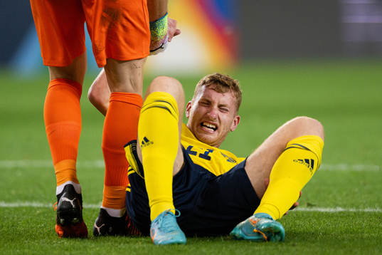 Dejan Kulusevski of Sweden in pain