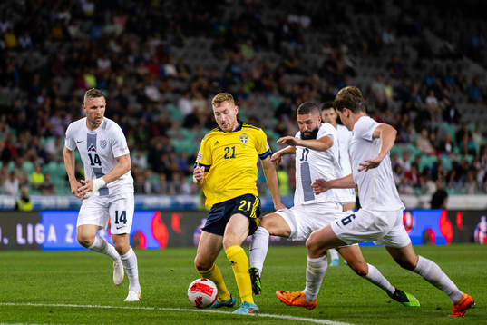 Dejan Kulusevski of Sweden against Jasmin Kurtic, Miha